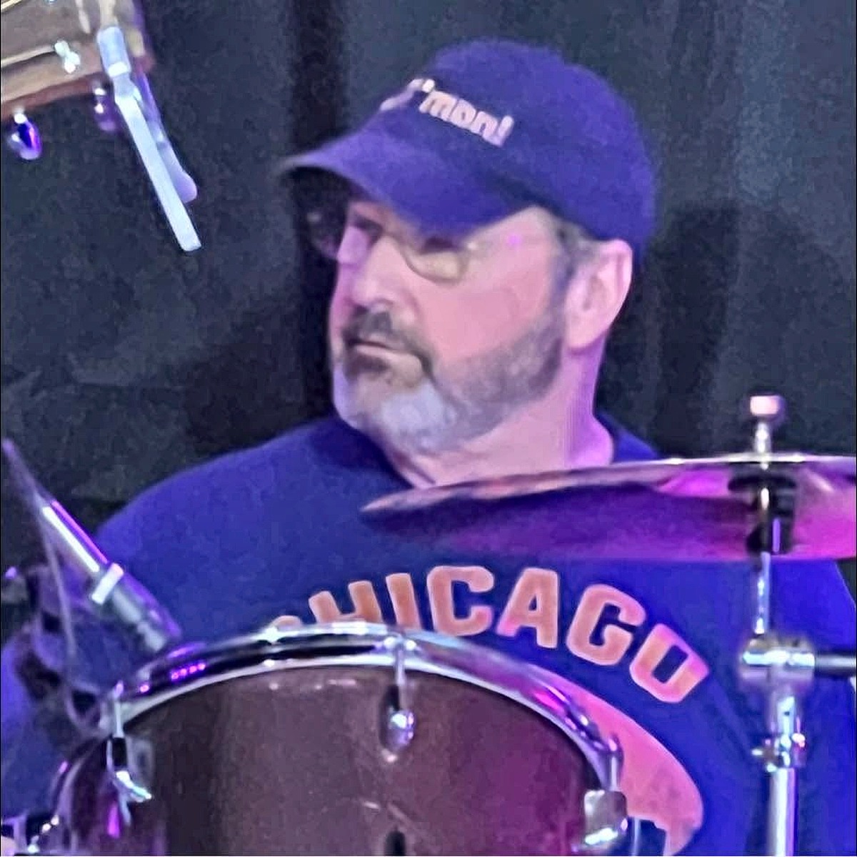 Tom Karch performing with A Sure Thing